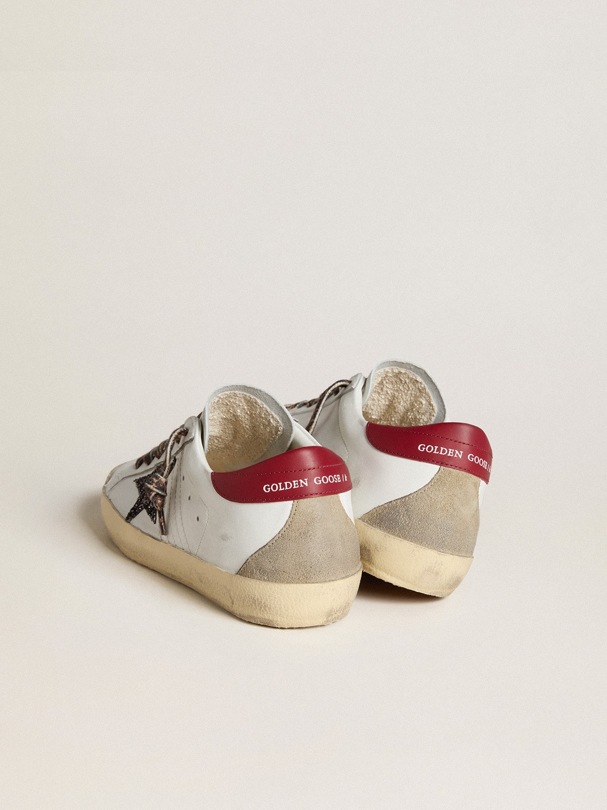 Nappa con stella in glitter e talloncino in nappa rossa