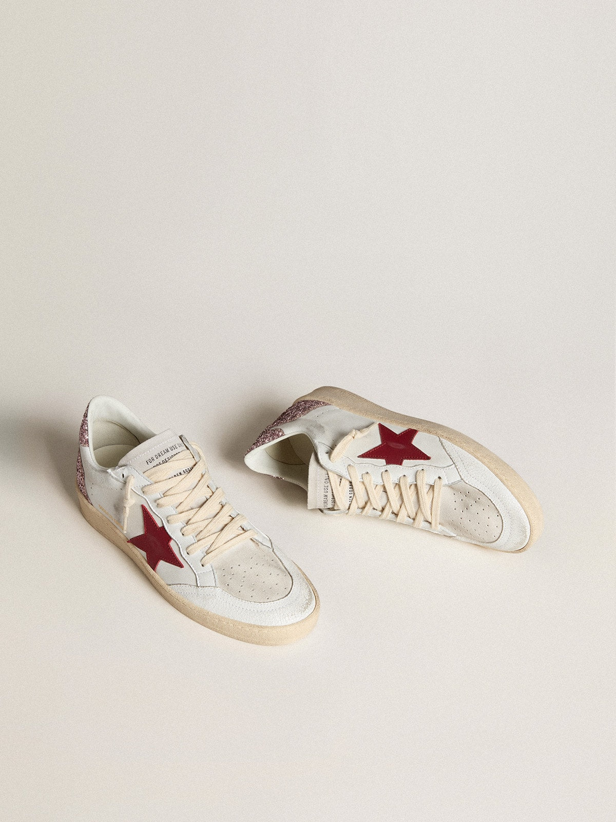 LTD con stella in pelle rossa e talloncino in glitter rosa