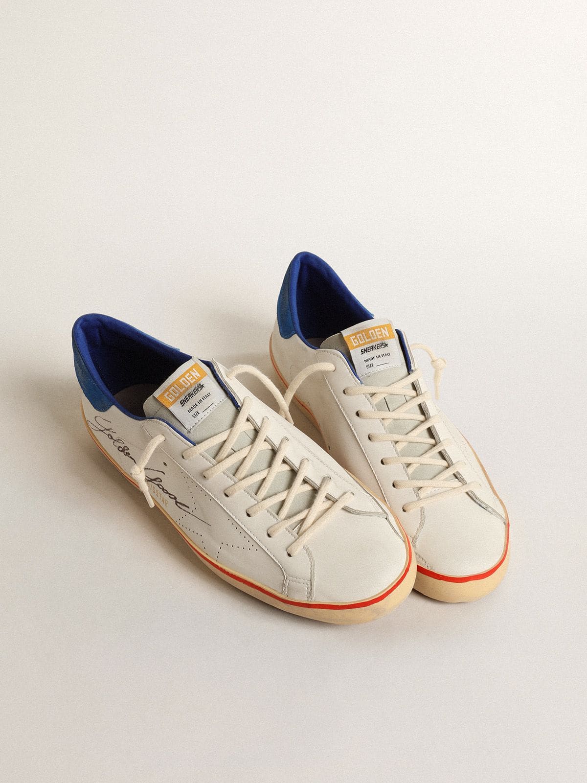 Stella traforata e talloncino in suede blu