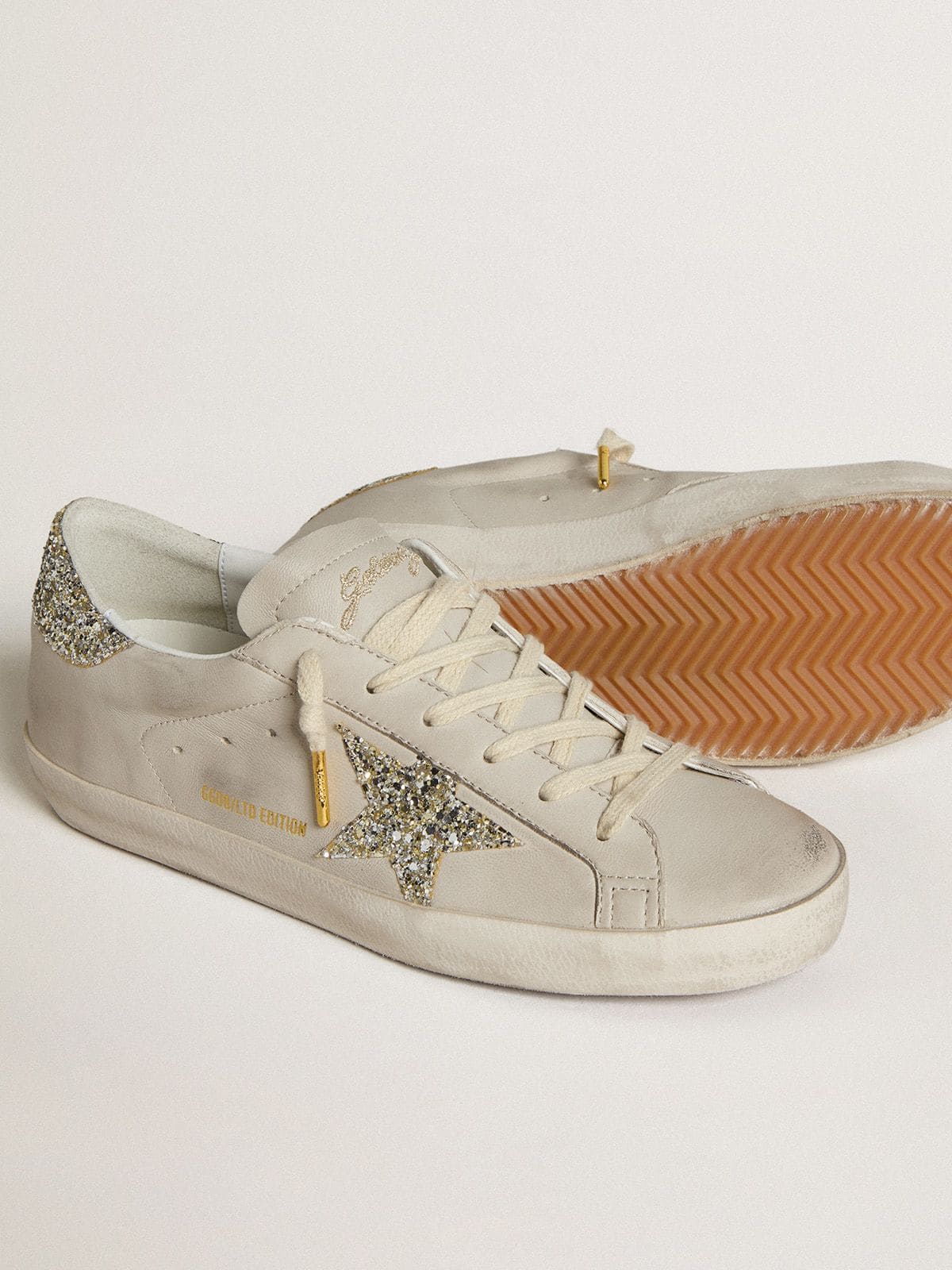 LTD in nappa avorio con stella e talloncino in glitter platino