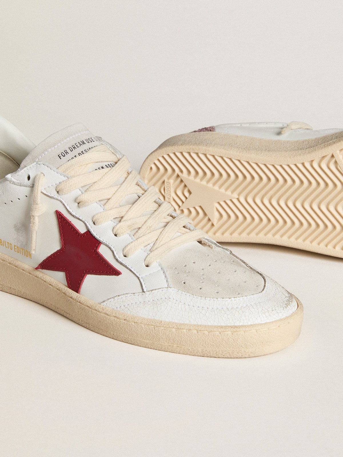 LTD con stella in pelle rossa e talloncino in glitter rosa