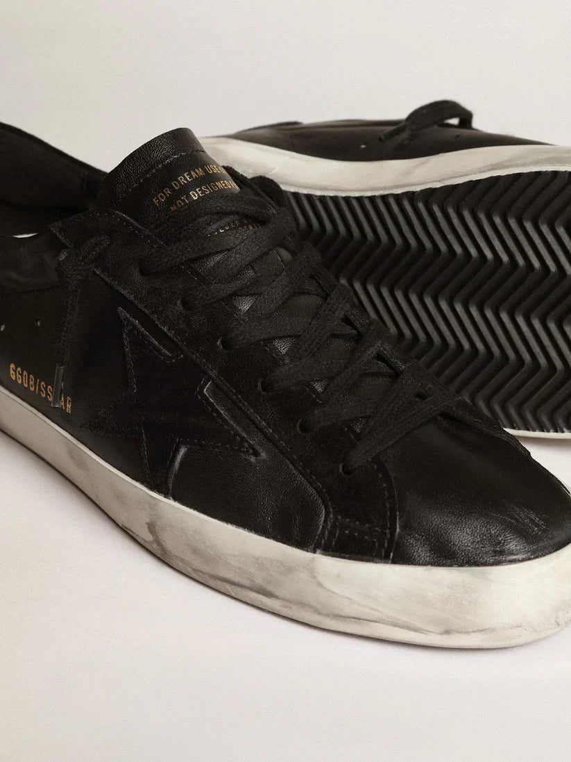 Nappa nera con stella e talloncino in suede nero