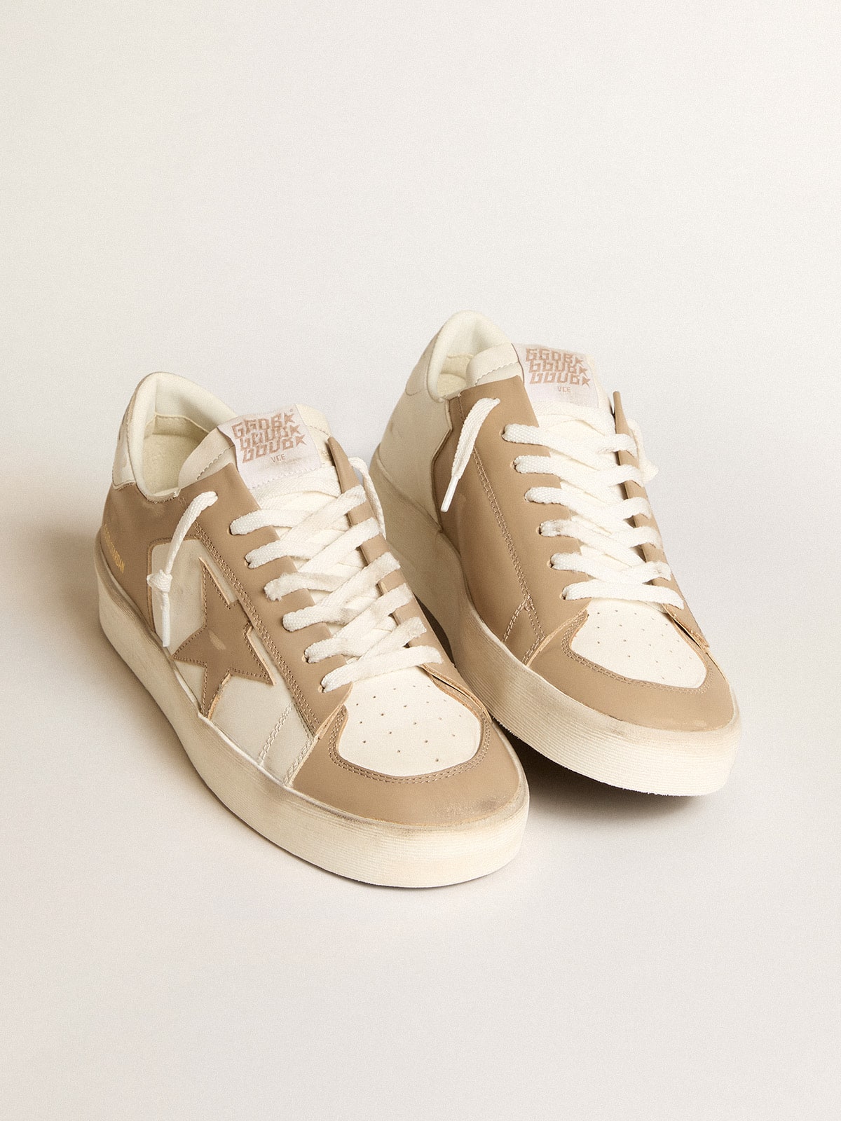 Pelle bianca e beige con stella beige e talloncino bianco