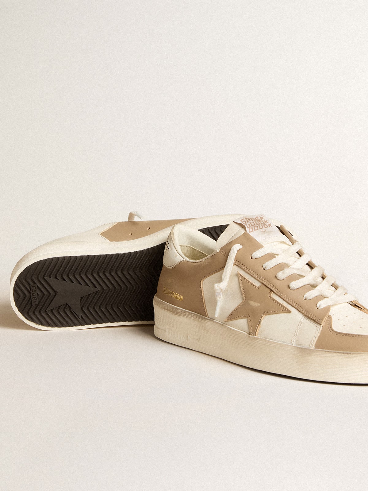 Pelle bianca e beige con stella beige e talloncino bianco