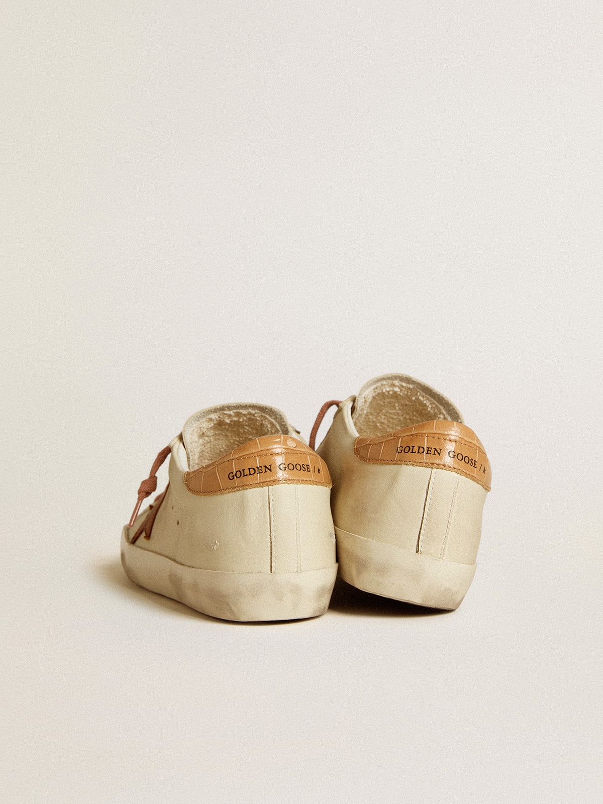 Stella in pelle e talloncino in pelle stampa coccodrillo
