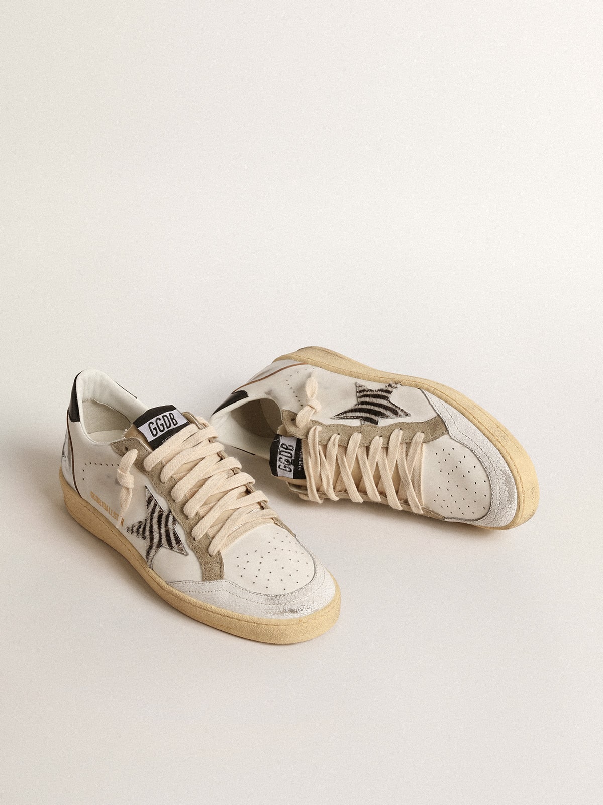 LTD con stella zebrata e inserto in pelle laminata