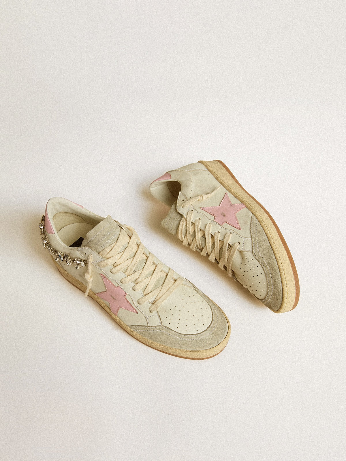 Donna LTD con stella in pelle rosa e applicazione con cristalli