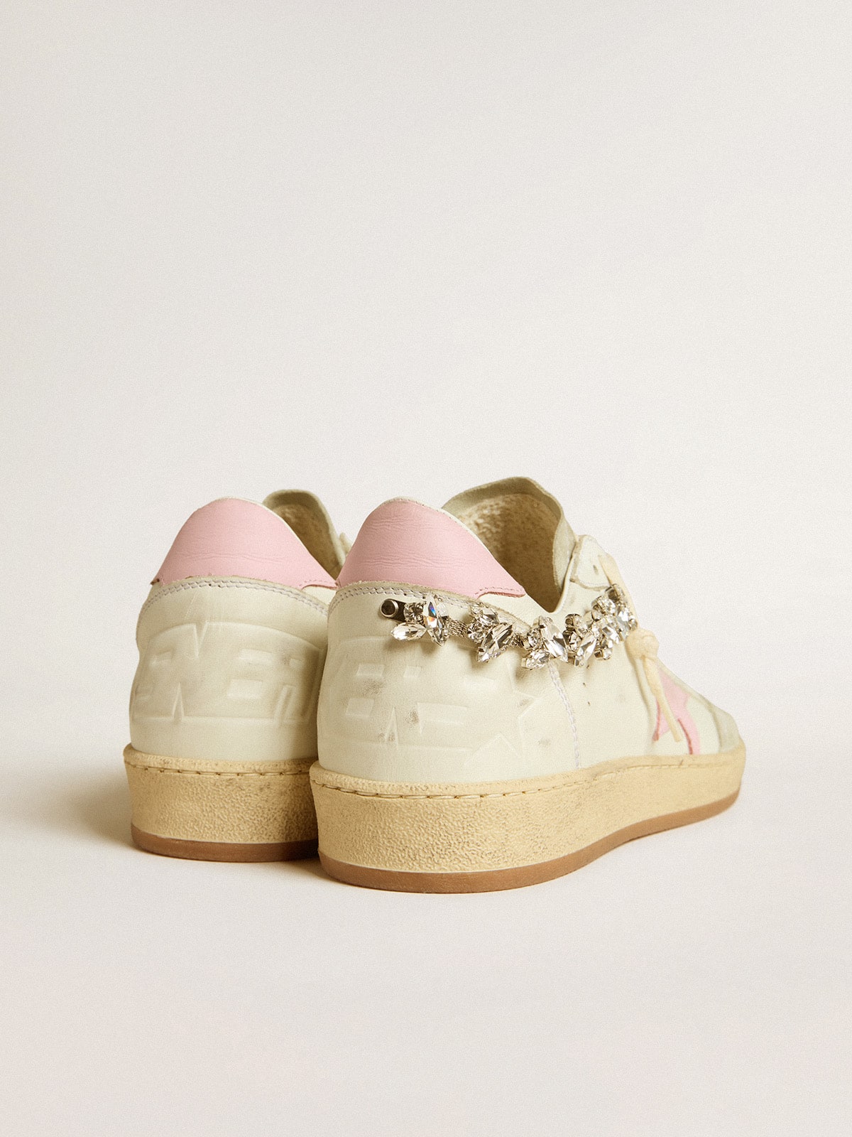 Donna LTD con stella in pelle rosa e applicazione con cristalli