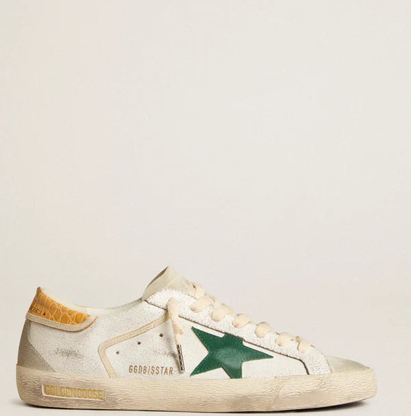 Stella in suede verde e talloncino in pelle cocco gialla