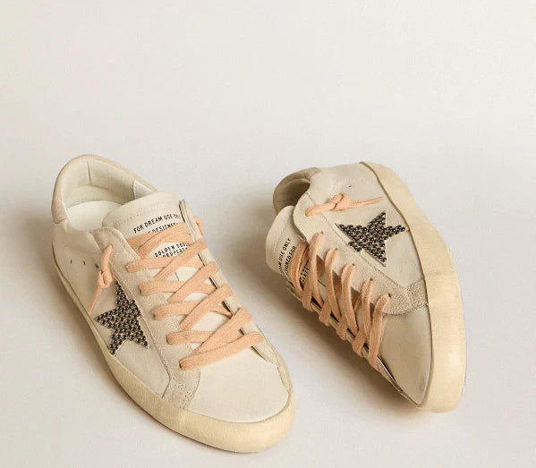 LTD in pelle con stella in suede beige con borchie Swarovski