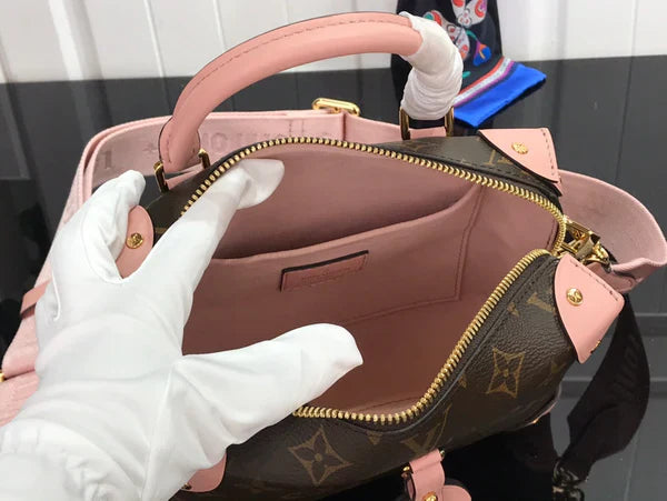LV PETITE MALLE SOUPLE Rosa